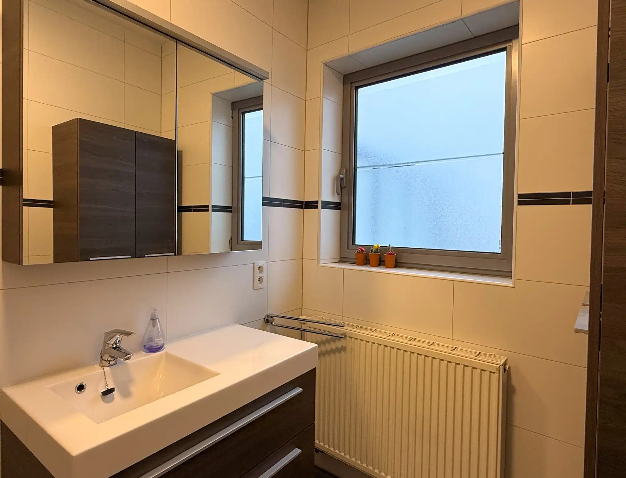 Appartement met zicht op de Grote Markt  met 1 slaapkamer, 2 terrassen en autostaanplaats foto 13