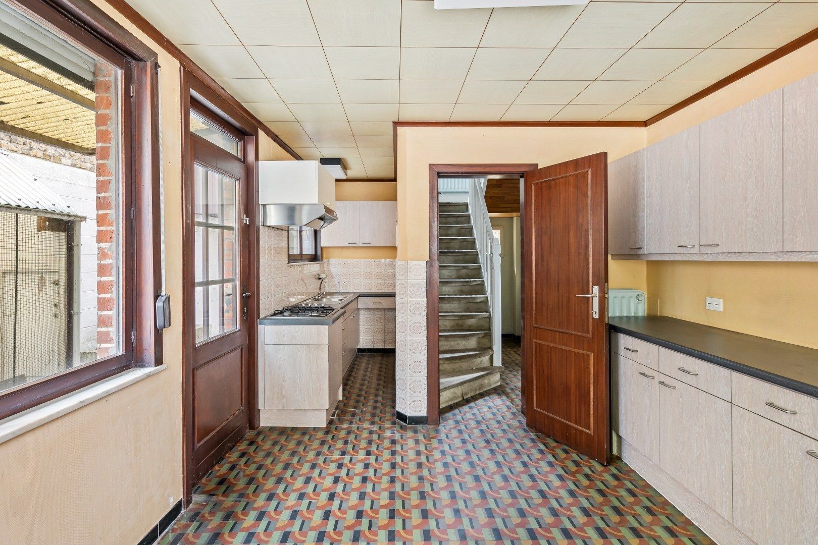 Gezellige stadswoning met 4 slaapkamers, ruime garage en koertje. foto 13