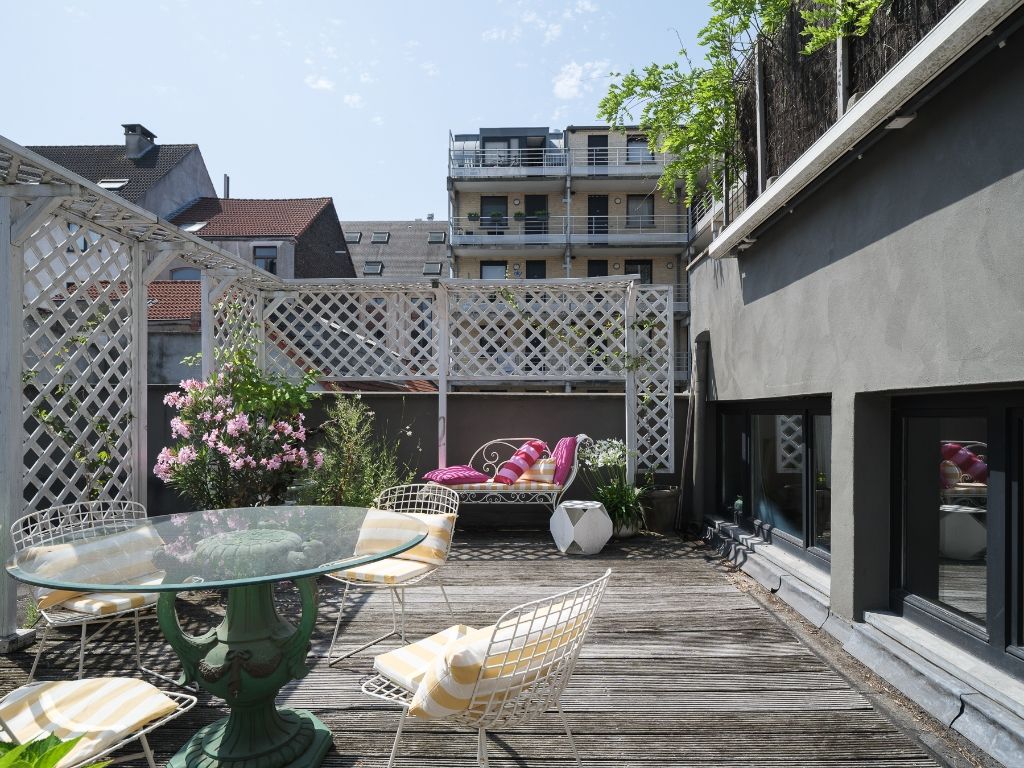 Imposant designappartement met loftallures nabij het Wintercircus en De Krook foto 4