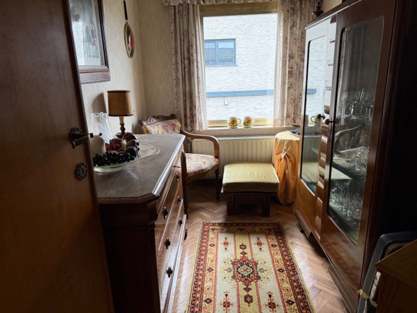 Charmante splitlevelwoning 2 slpks en grote garage te Tienen foto 11