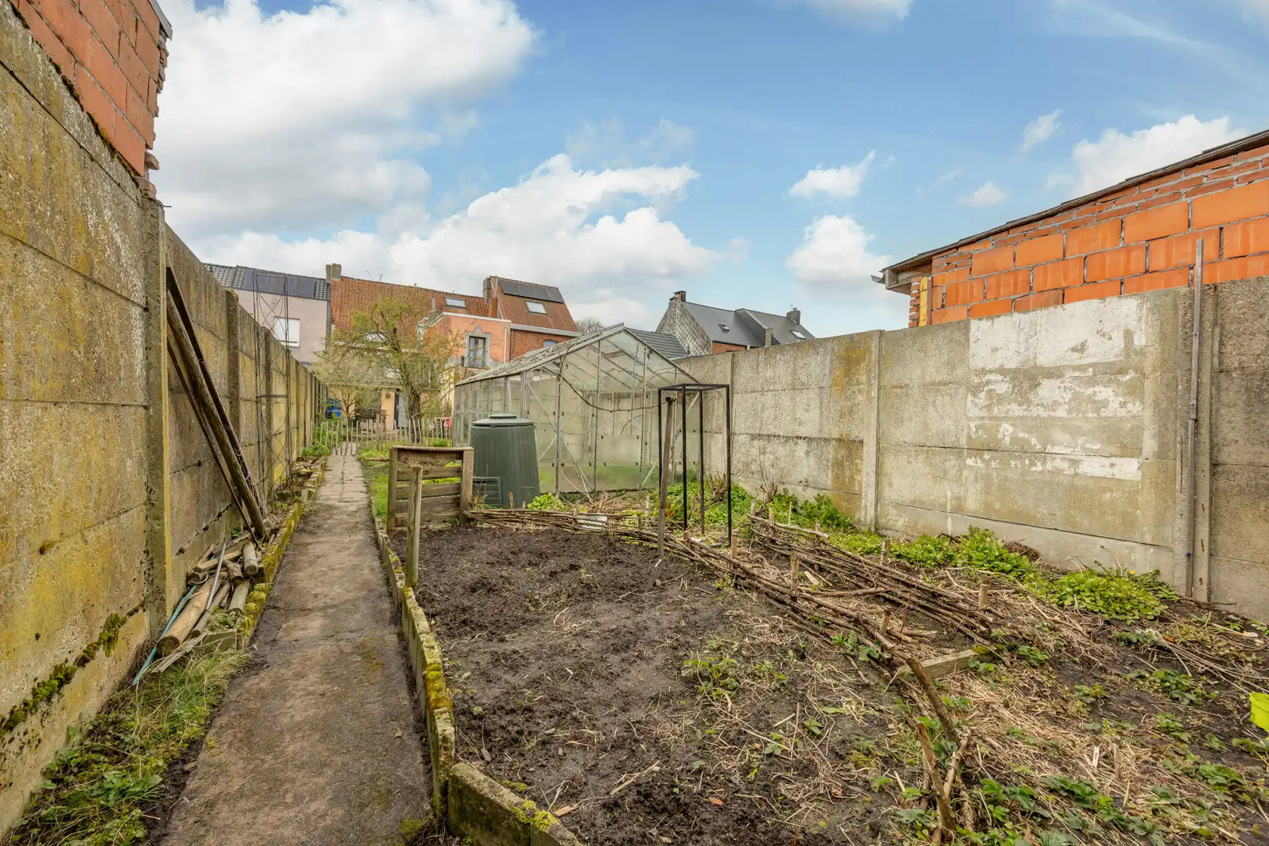 Stadswoning op een perceel van 230 m² met toegang achteraan de tuin. foto 17