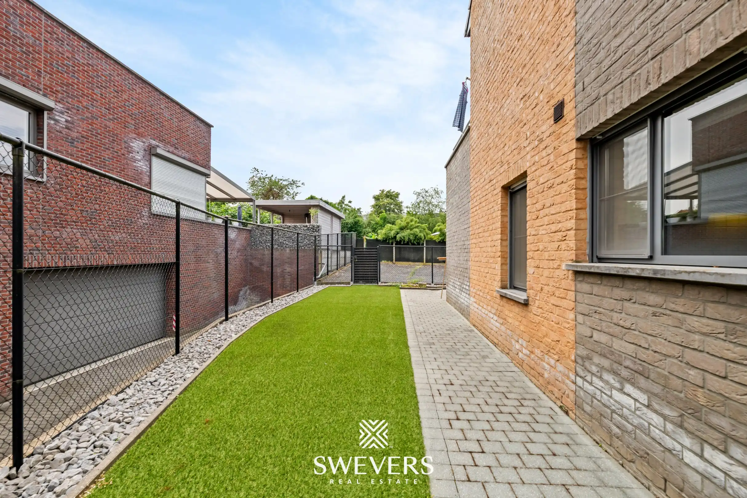 Ruim gelijkvloers appartement met tuin en ondergrondse autostaanplaats foto 30
