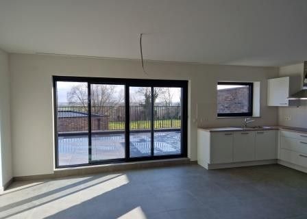 NIEUWBOUW DUPLEX APP in kleine res. - Ruime leefruimte + terras, 3X SLP + privatieve GARAGE + KELDER foto {{pictureIndex}}