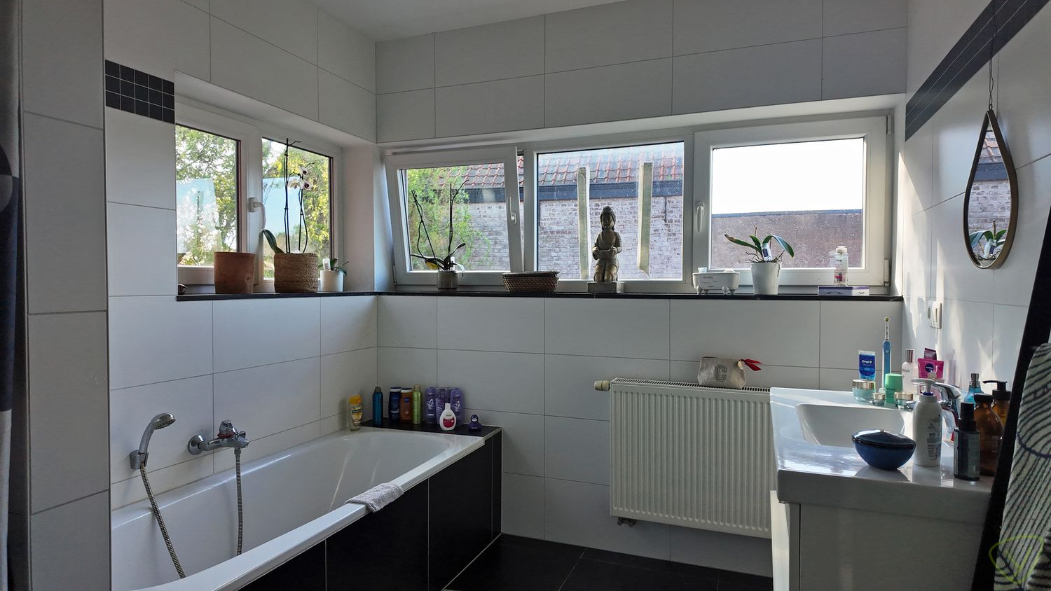 Recente gezinswoning met zonnige tuin, garage en centrale ligging! foto 6