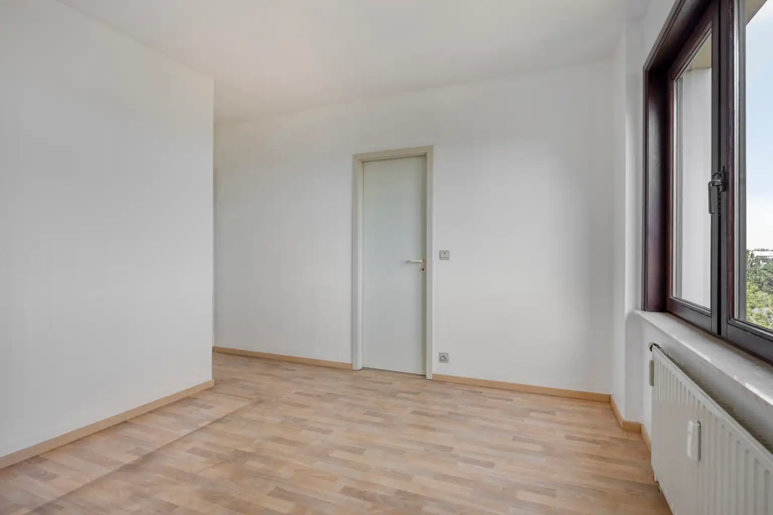 Ruim 3-slaapkamerappartement met garage op toplocatie foto 10