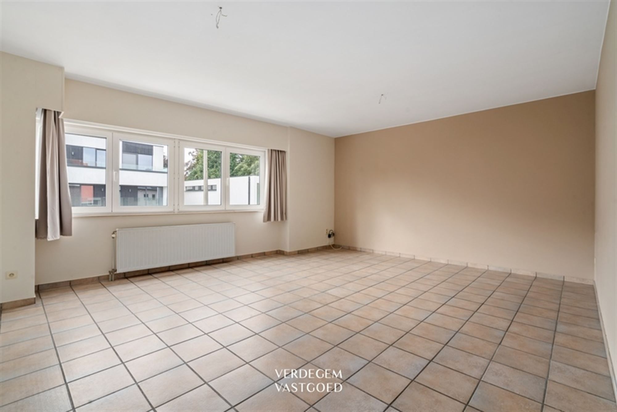 Instapklaar en energiezuinig appartement met 2 slaapkamers, groot terras en garage foto 3