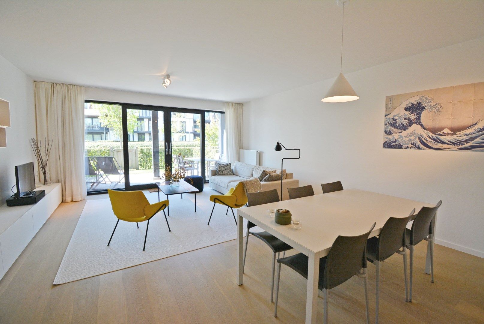 Recent en zonnig tuinappartement aan meer Duinenwater foto 2