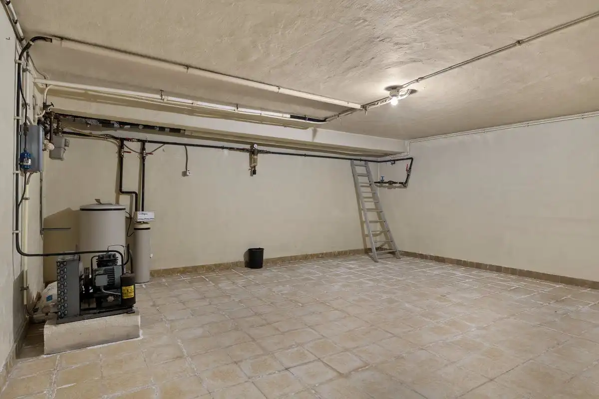 Te renoveren woning te koop in Niel foto 23