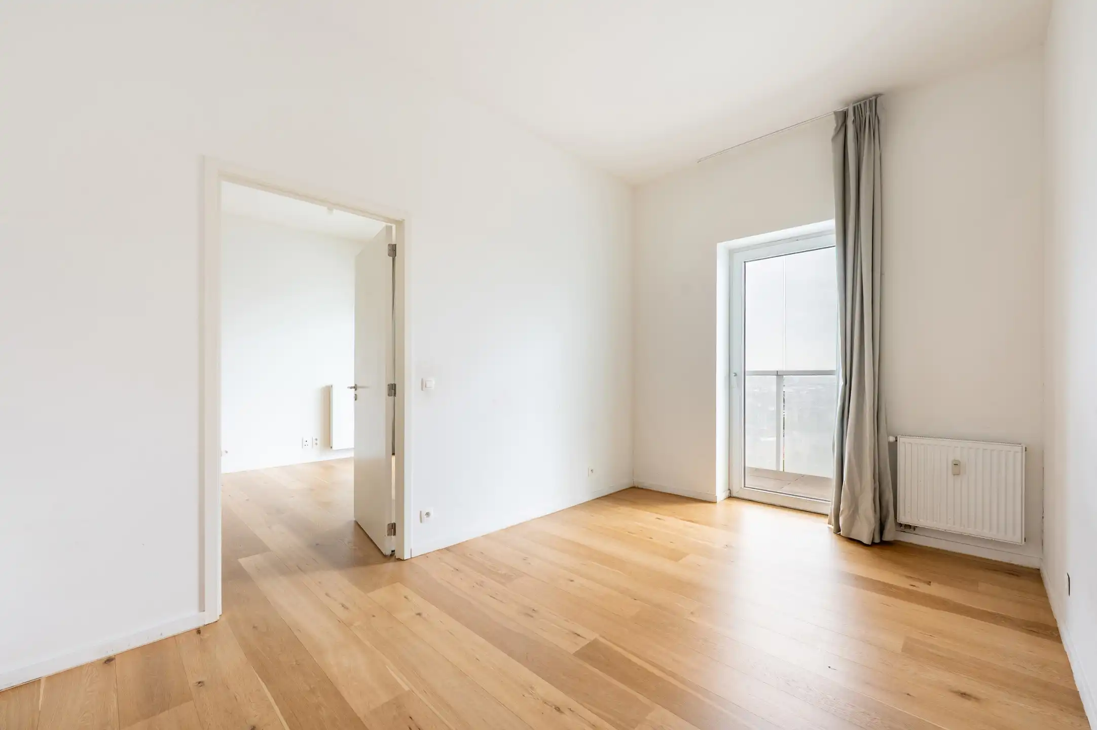 Lichtrijk appartement met terras en EPC A foto 8