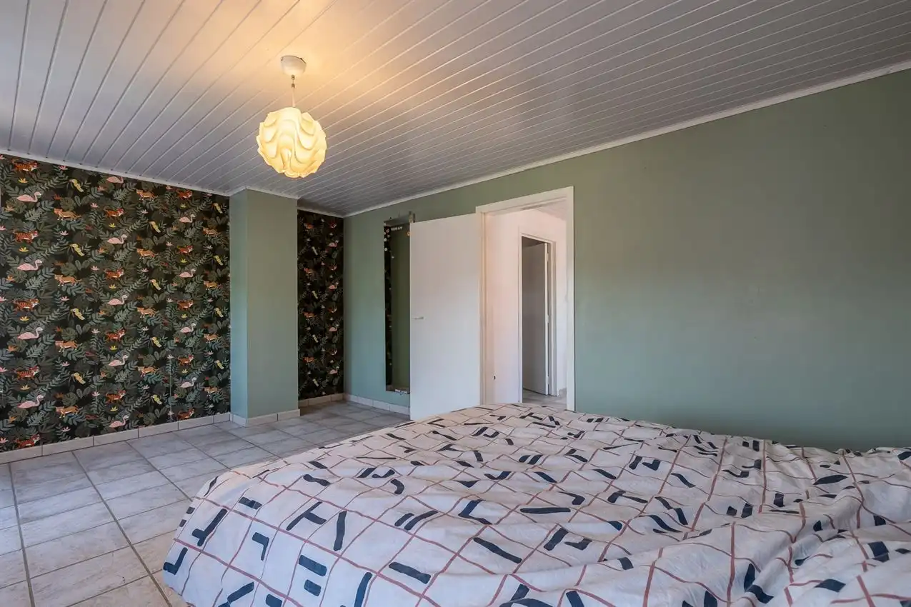 Verzorgde woning met 2 slpk., tuin en garage foto 16