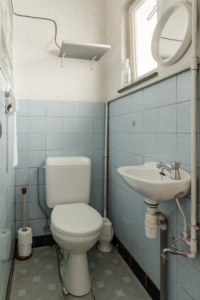 Karaktervolle woning met potentieel op toplocatie in het centrum van Hechtel foto 14