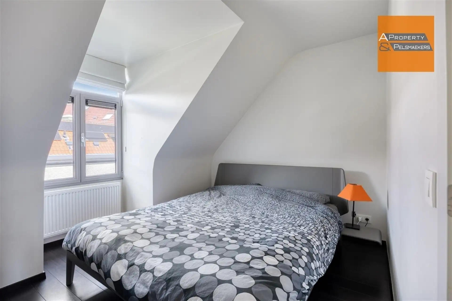 Instapklaar duplex-appartement met groen uitzicht in het centrum van Ottenburg foto 12
