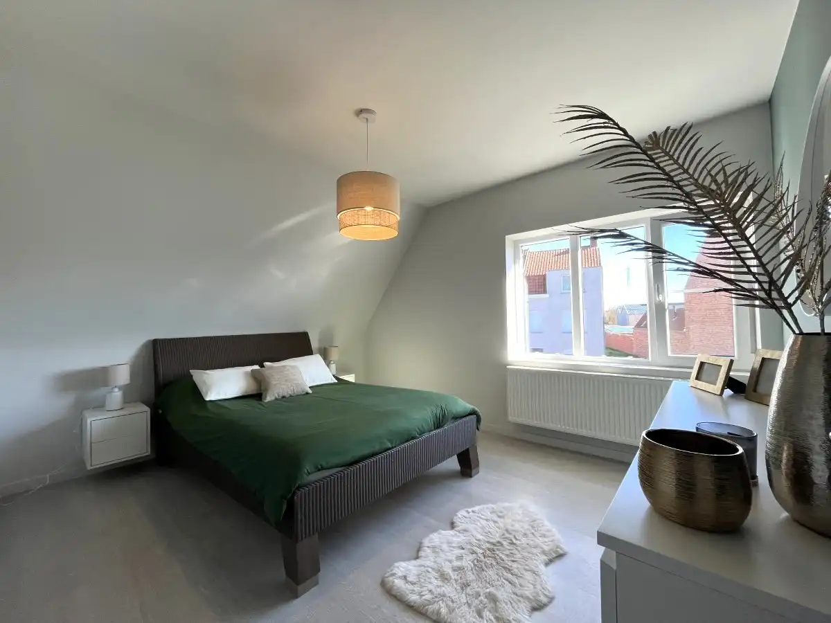 Izegem - Volledig gerenoveerde open bebouwing met zonnige tuin foto 11