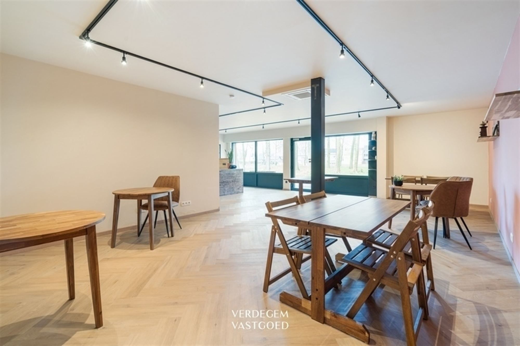 Wonen en werken op een unieke locatie: handelsgelijkvloers met appartement en tuin foto 4