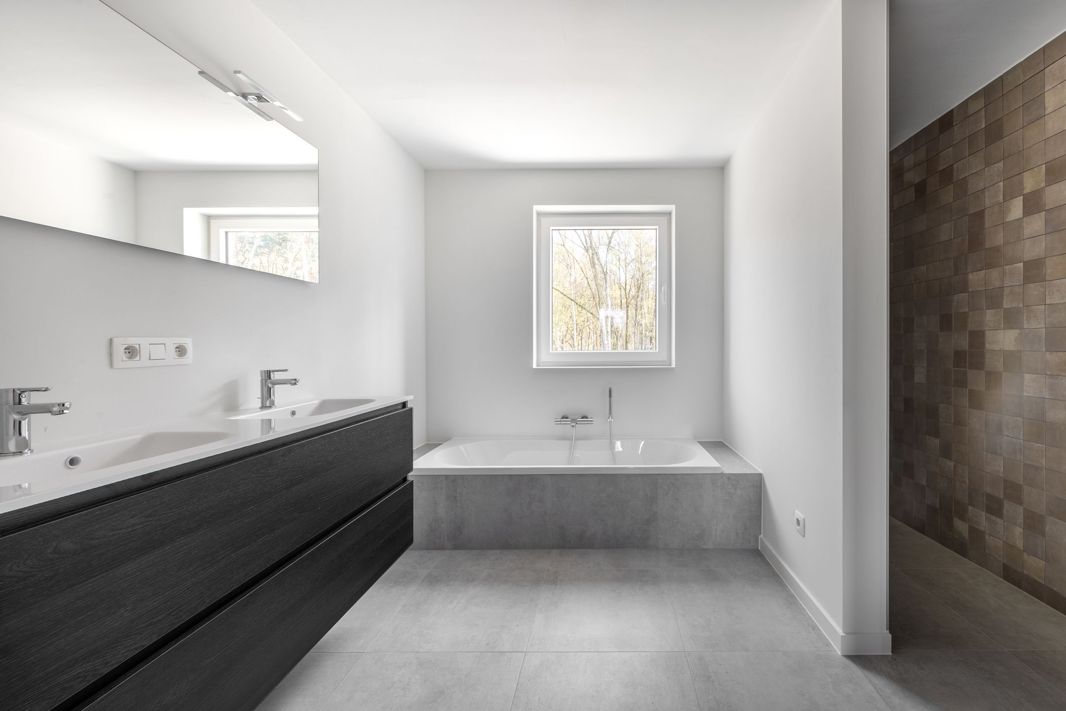 Stijlvolle nieuwbouwkoppelwoning met adembenemend boszicht foto 24