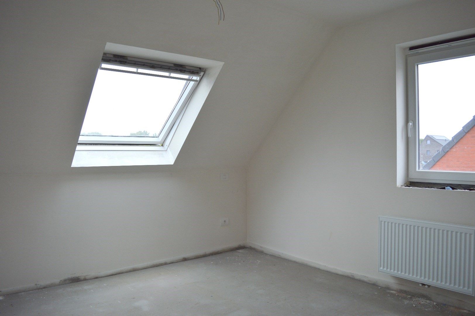 Instapklare woning met 3 slaapkamers en carport in kindvriendelijke ligging te Heule foto 7