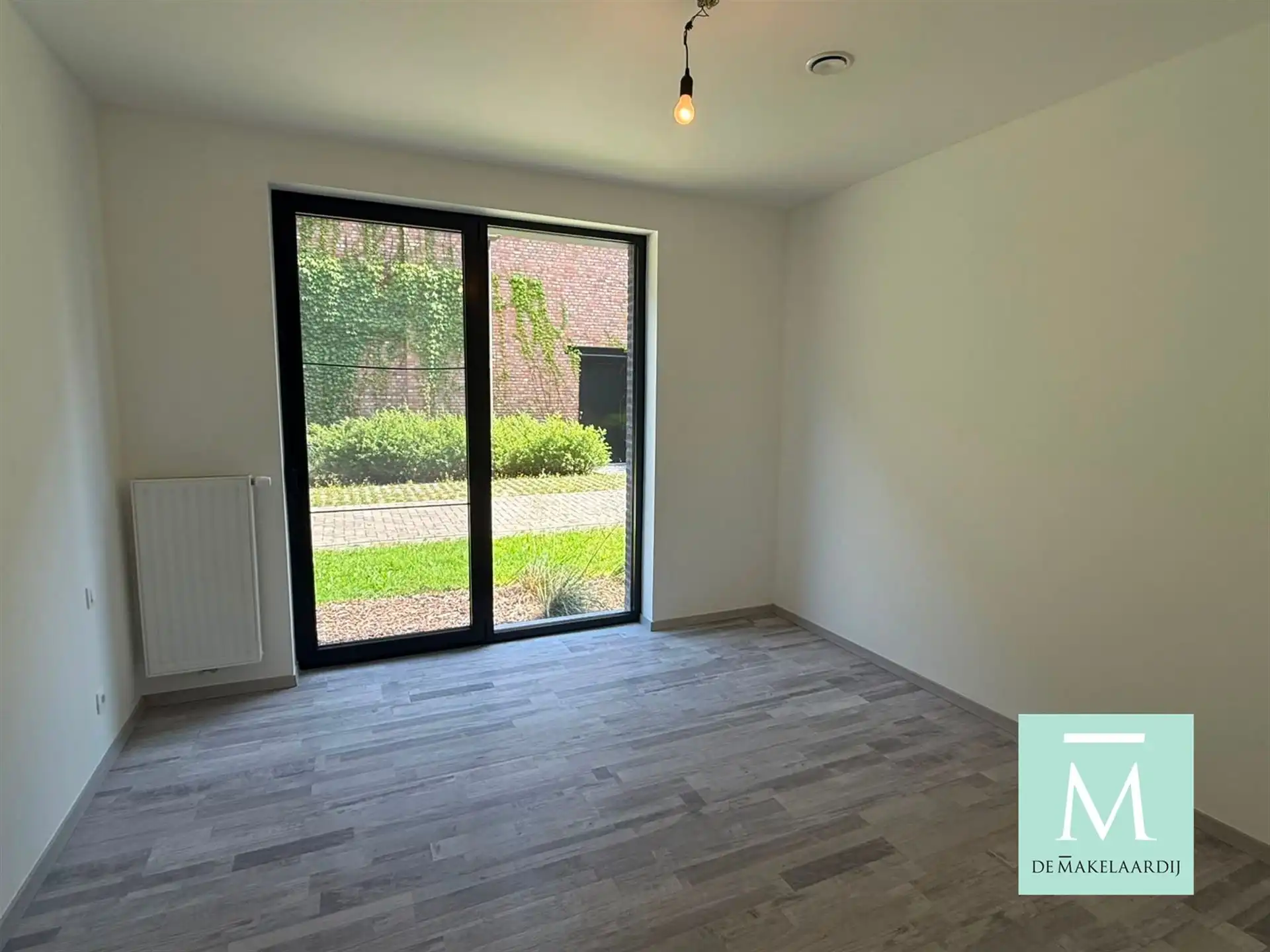 Nieuwbouwappartement met 2 slaapkamers en tuin! foto 4