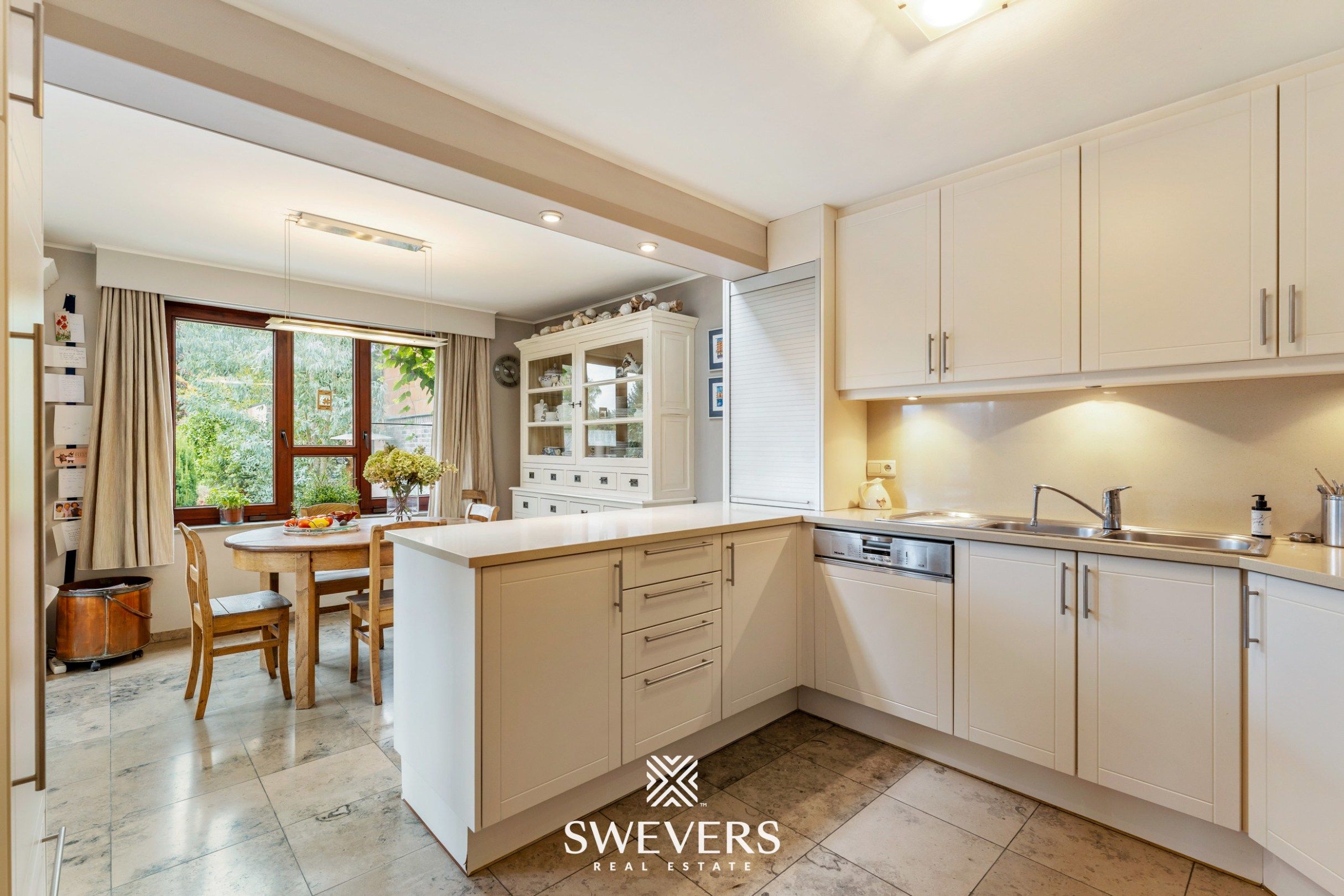 Opbrengsteigendom: lichtrijke en instapklare woning op 9a75ca nabij Hasselt centrum foto 10