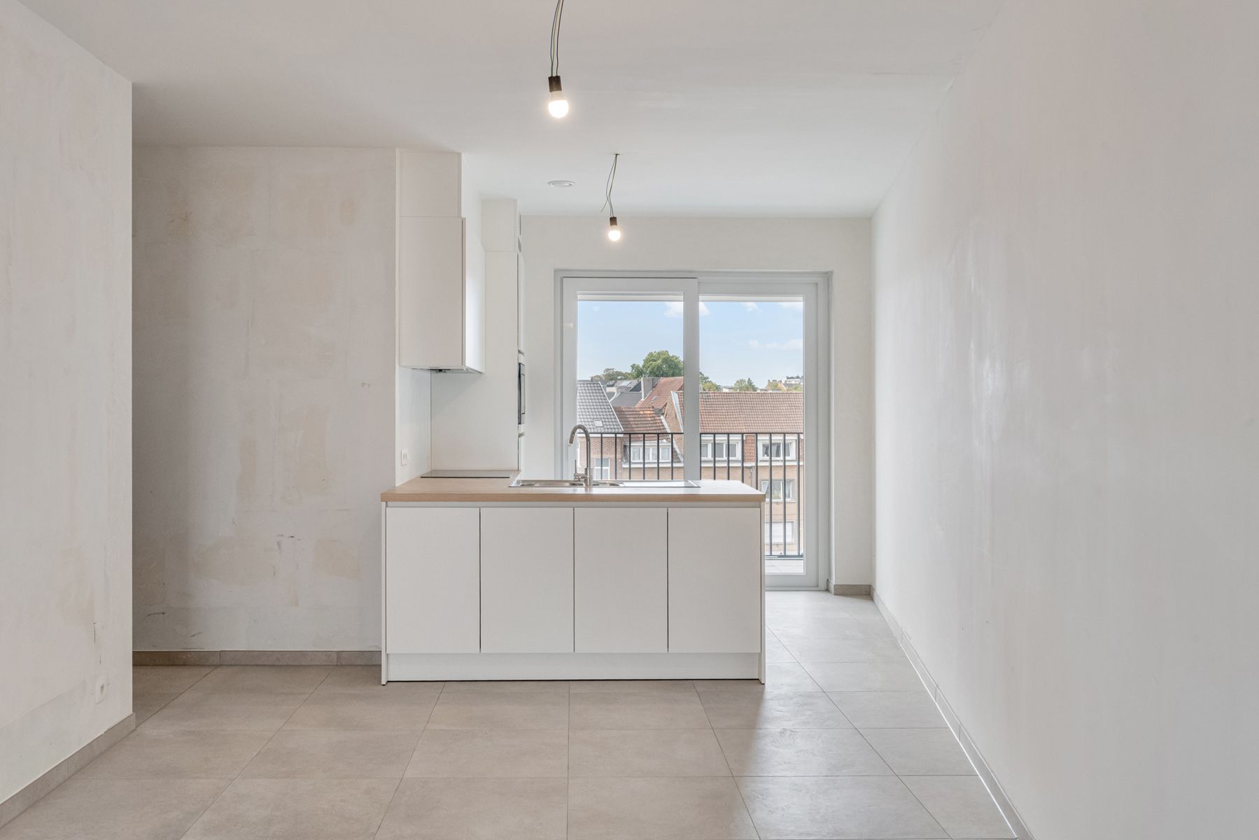 Nieuwbouwappartement met 2 slpks + terras foto 2