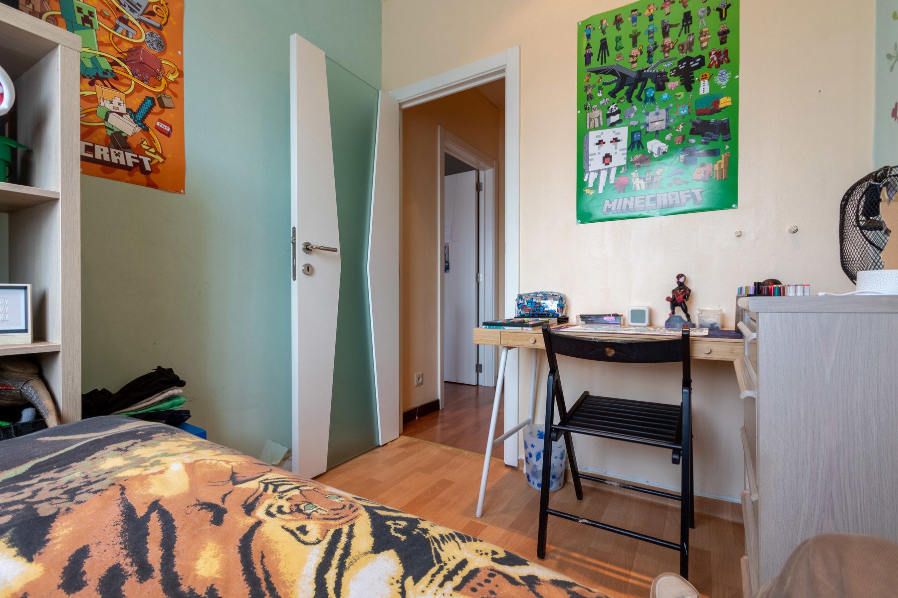 Goed onderhouden woning met 4 slaapkamers en leuke tuin foto 14