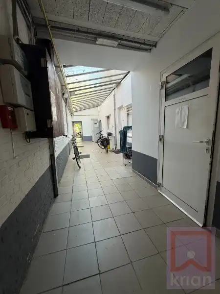 Gebouw met 11 kamerwoningen, centrum Geel op 8a66. foto 3