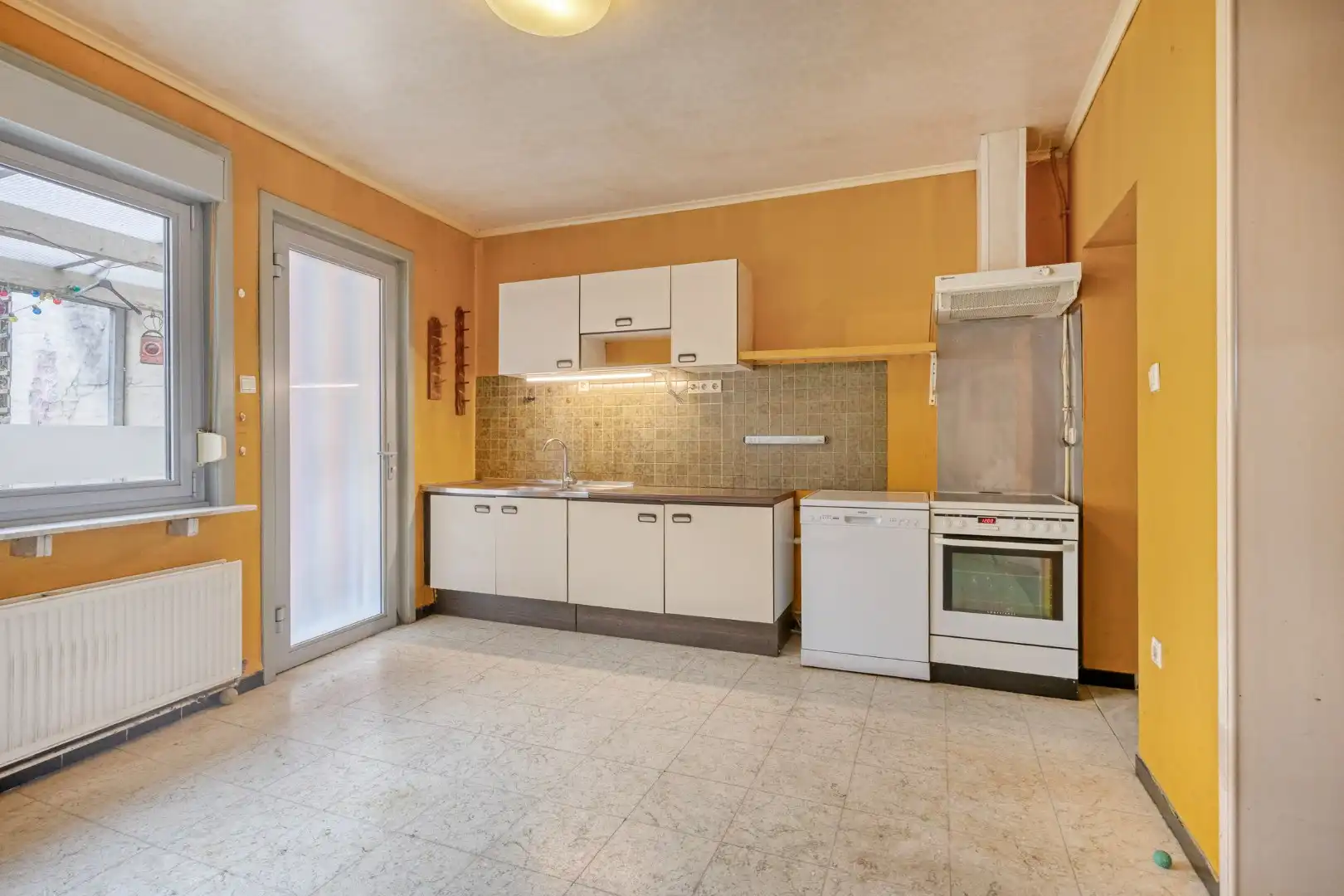 Ruime woning met kelder, zolder en tuin in Kessel-Lo! - EPC 443 kWh/m² - bewoonbare opp. 205 m² foto 8