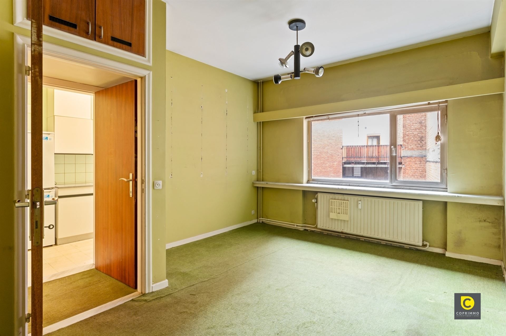 Te renoveren appartement op toplocatie! foto 4
