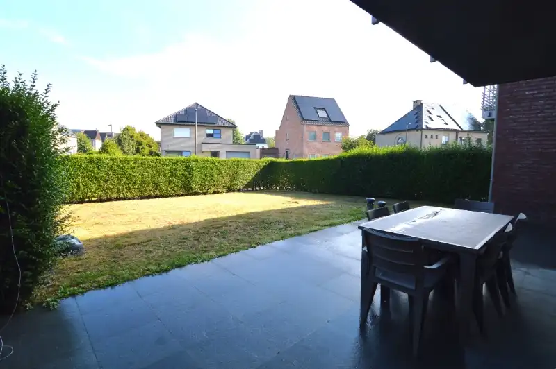 Gemeubeld gelijkvloers appartement met tuin – Heffen foto 15