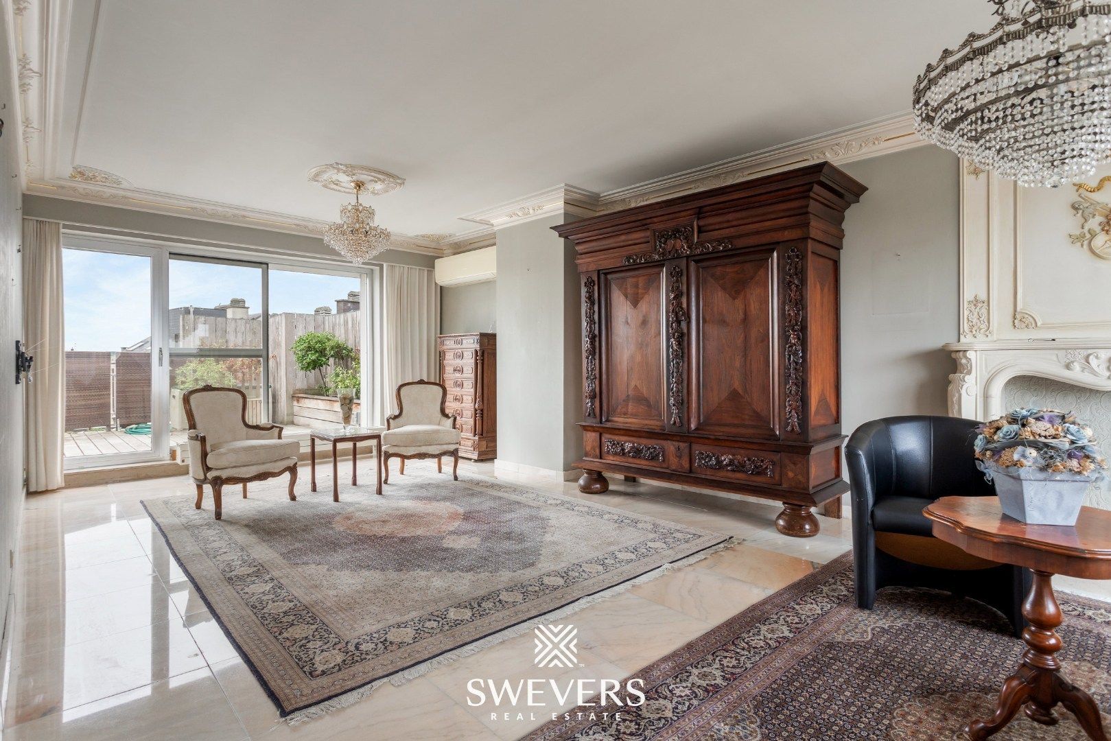 Riant penthouse met potentieel (137m²) en ruime terrassen (120m²) in centrum Sint-Truiden foto 2
