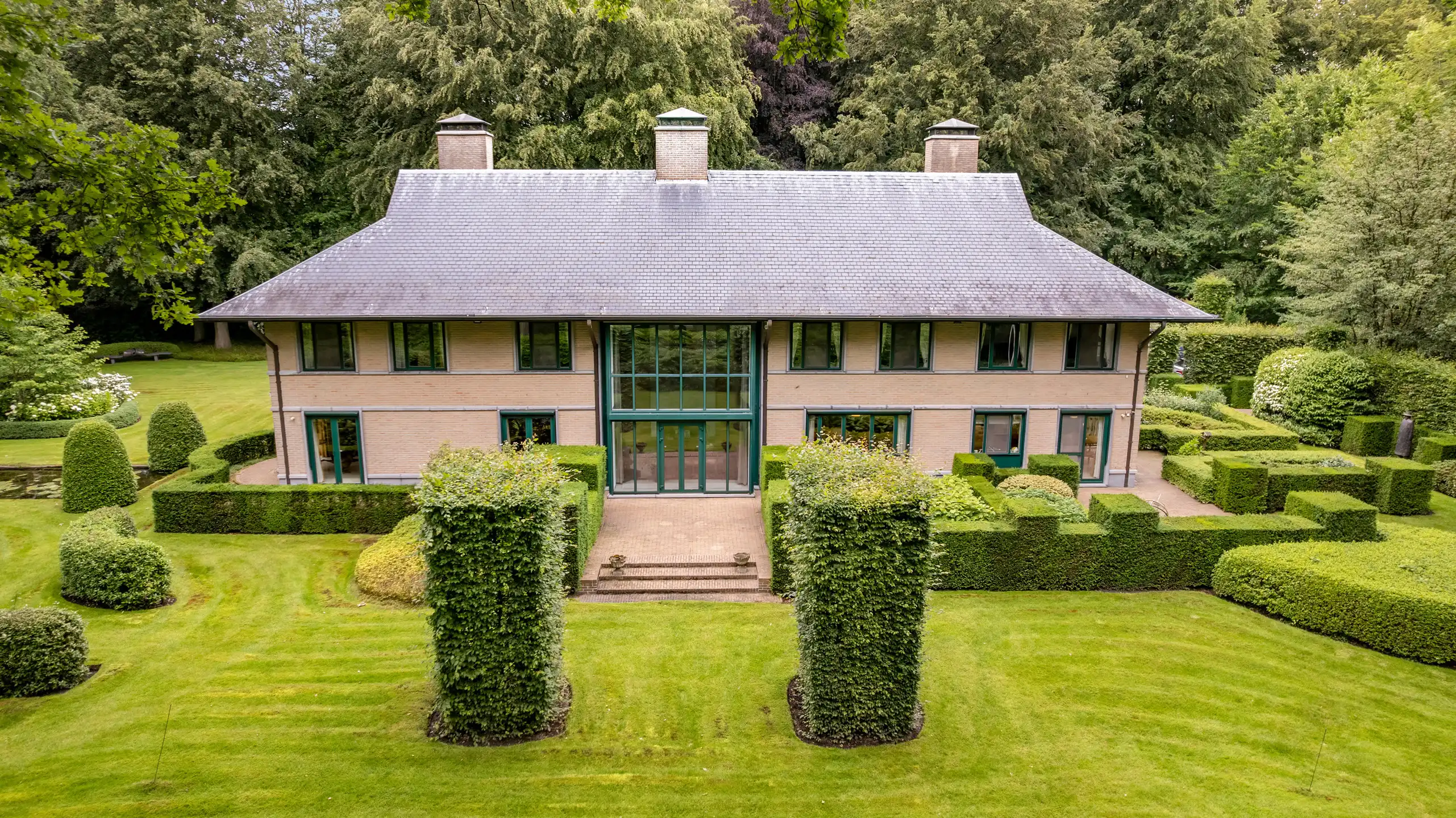 Exclusieve villa met parktuin in Vriesdonk en binnenzwembad, op ca. 6.411 m² foto 2