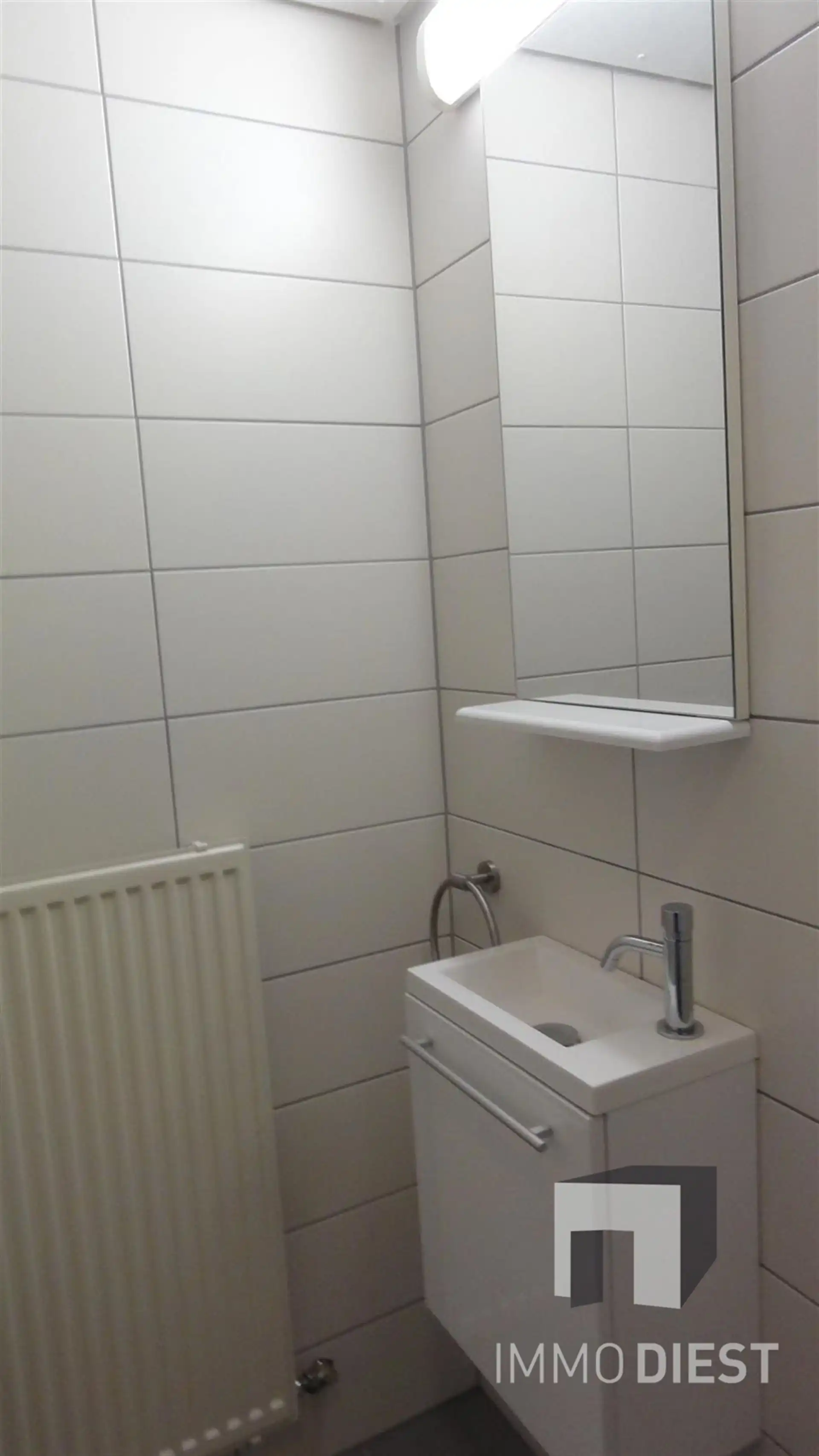 Knap nieuwbouwappartement met 1 slaapkamer, autostaanplaats en kelderberging foto 16
