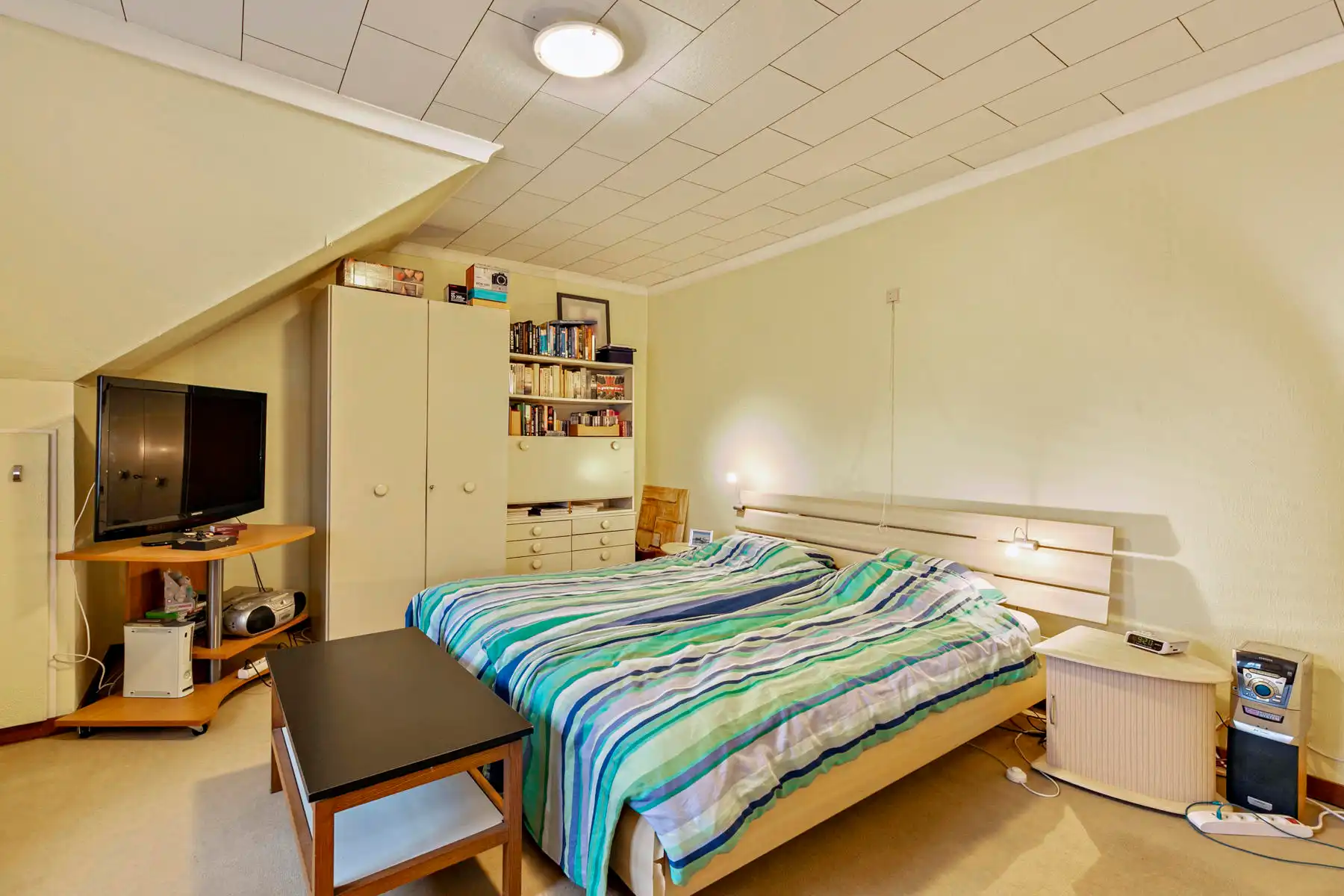 In de dorpskern van Neeroeteren gelegen halfvrijstaande woning met 2 slaapkamers. foto 20