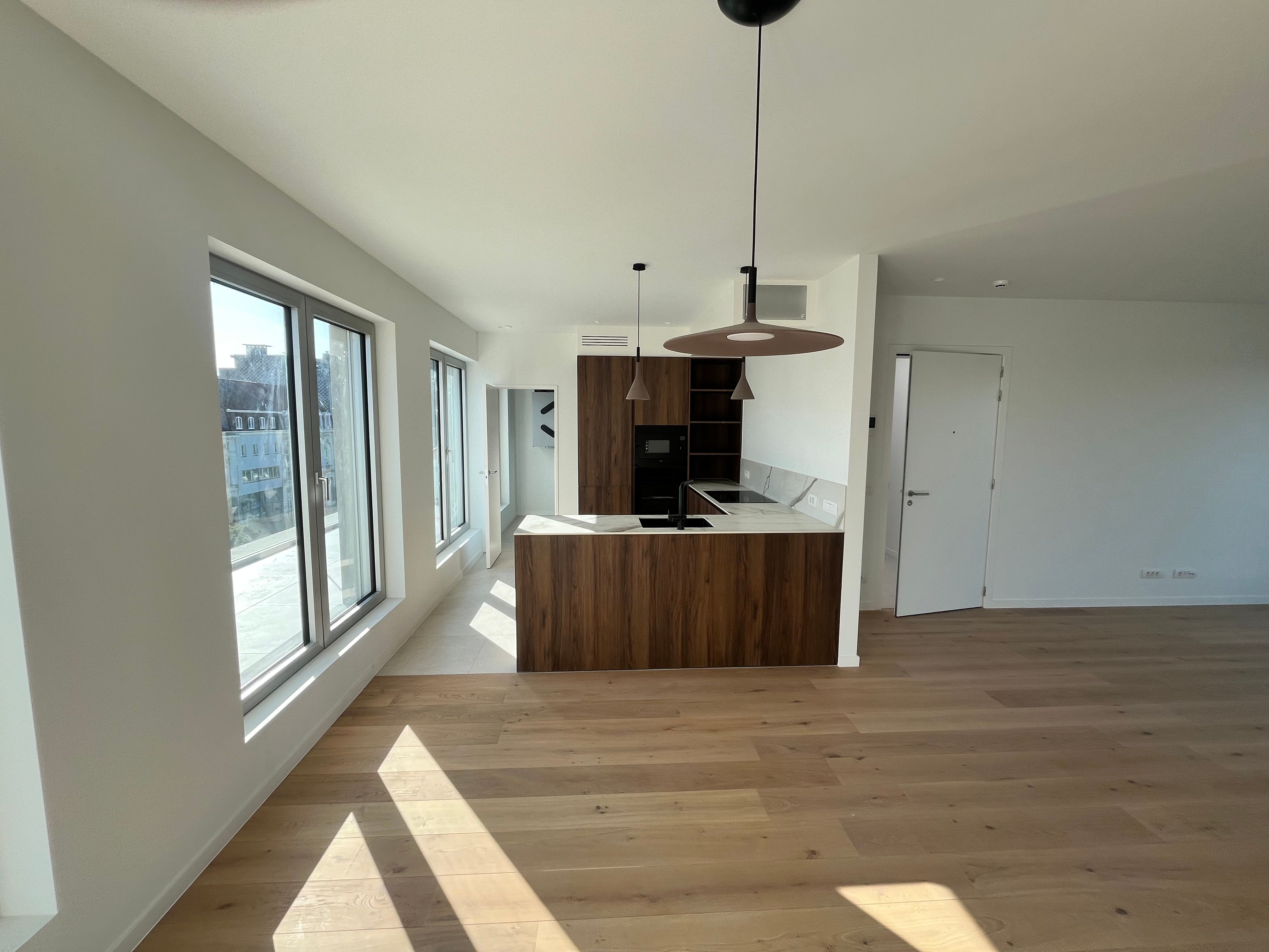 Instapklaar nieuwbouwappartement te huur in hartje Eeklo! foto 3