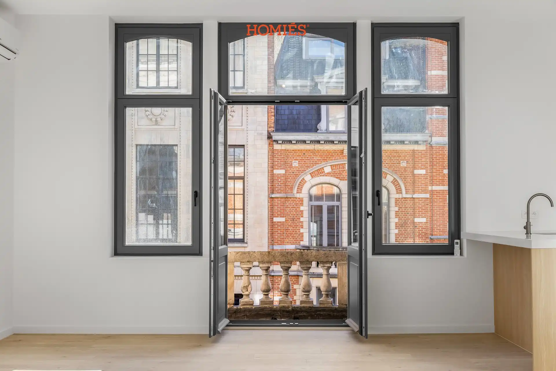 Luxe duplex met 2 slaapkamers aan de Grote Markt foto 4