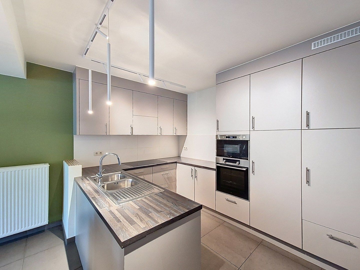 Gelijkvloersappartement met 2 slaapkamers en 2 autostandplaatsen foto 7