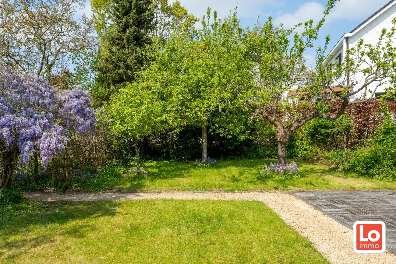 Degelijke open (kangoeroe)woning met inpandige garage en gezellige zuidwest georiënteerde tuin op een rustige locatie nabij het centrum van Lochristi! foto 32