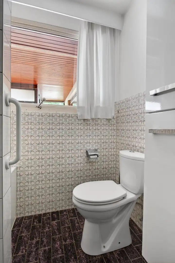 Ruime gelijkvloerse woning met veel potentieel op rustige ligging in Mol foto 31