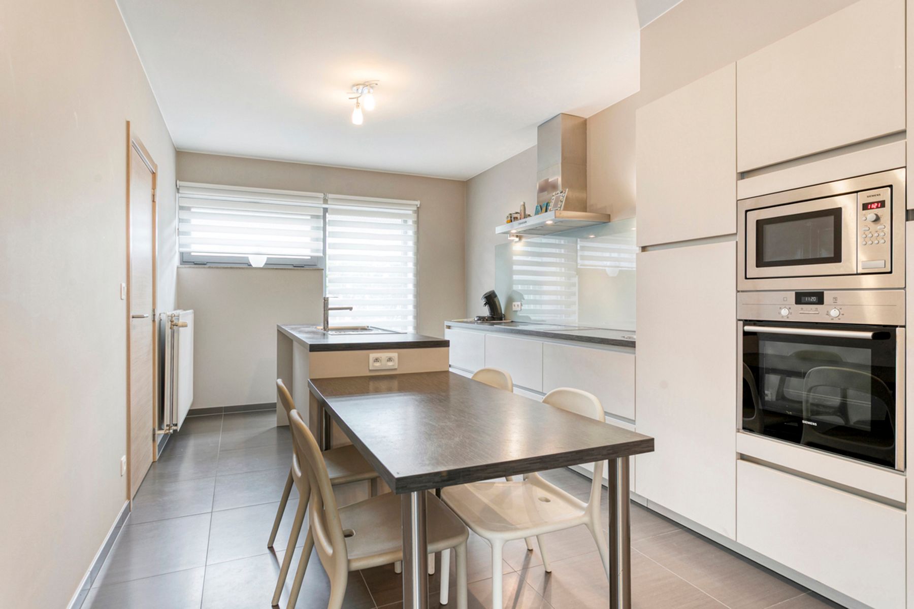 Recente HOB met 2 slaapkamers, tuin en garage! foto 9