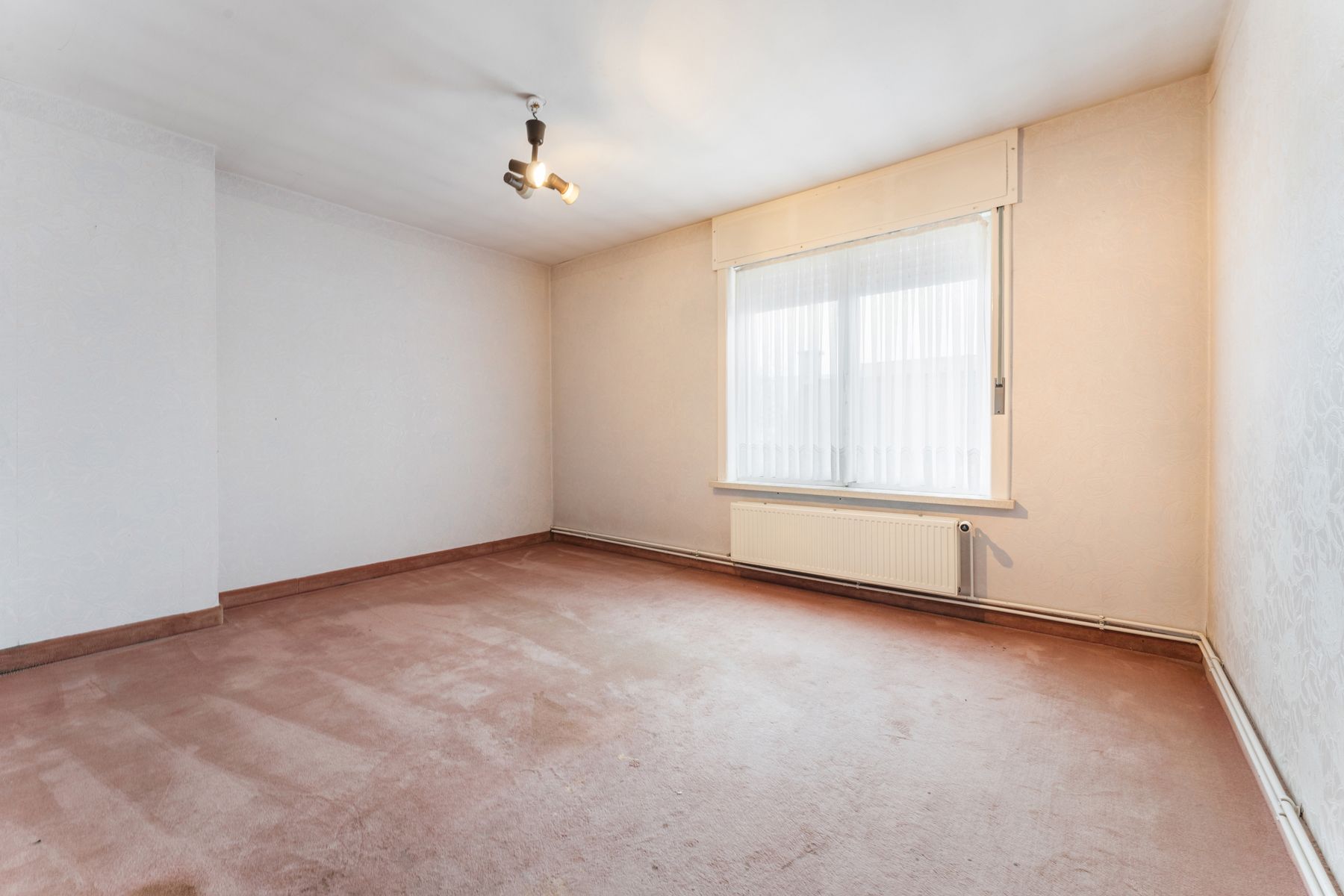 Centraal gelegen woning met 4 slpk , 2 garages en stadstuin foto 14