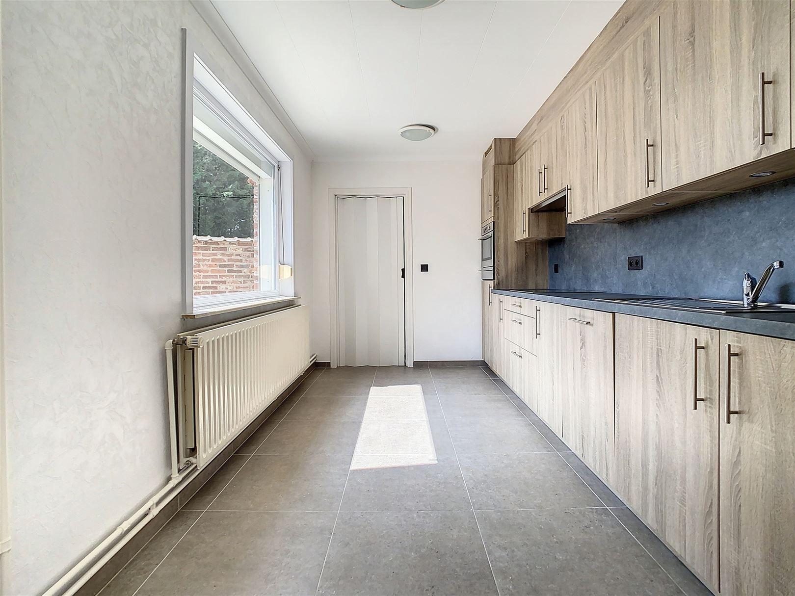 Instapklare woning, 2 slpks, tuin en garage foto 12