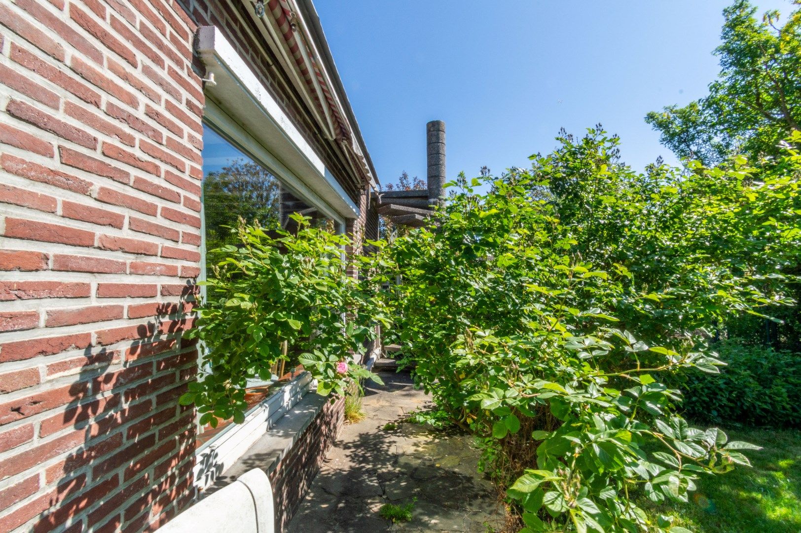 RUIME WONING MET 4 SLAAPKAMERS, GARAGE & ZUID-TUIN ! foto 7