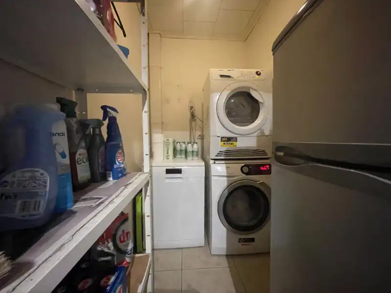 GELIJKVLOERS APPARTEMENT MET TWEE SLAAPKAMERS, TUIN EN GARAGE TE HUUR foto 11