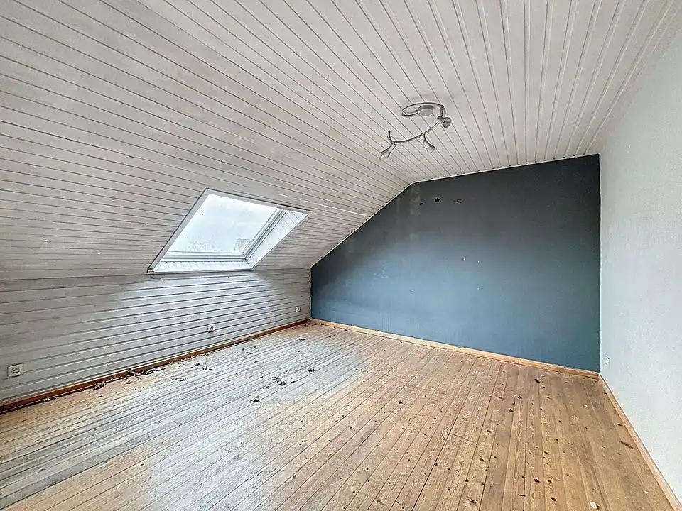 Te renoveren huis te koop in centrum Wuustwezel foto 12