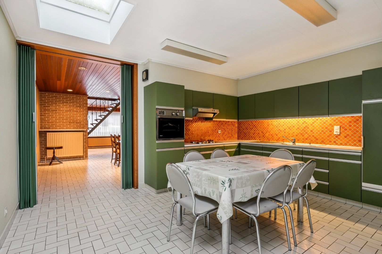 Woning met 3, mogelijks 5 slaapkamers en tuin met uitweg in Kortrijk-centrum foto 2