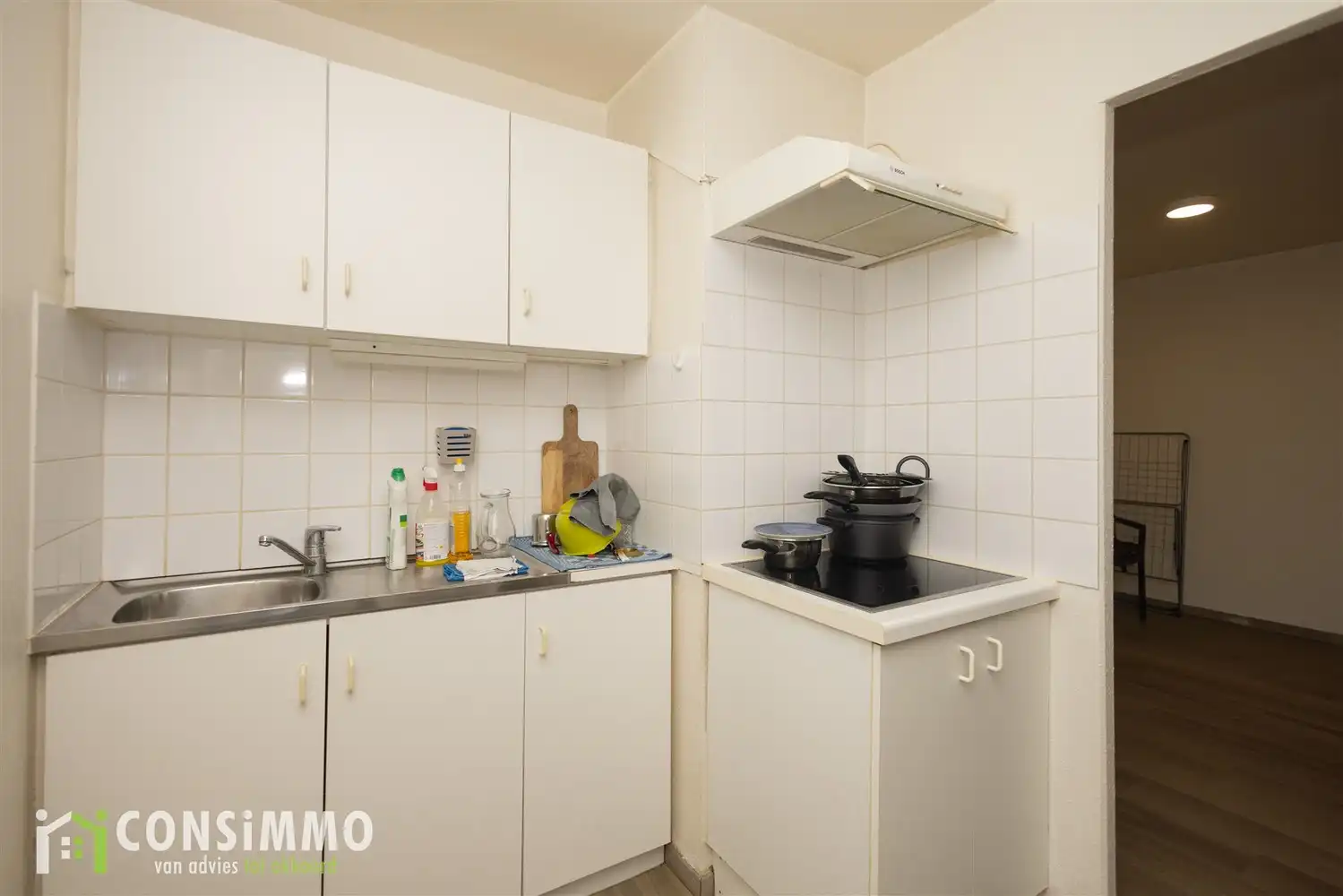 Handelspand met appartement in het centrum van Genk foto 17