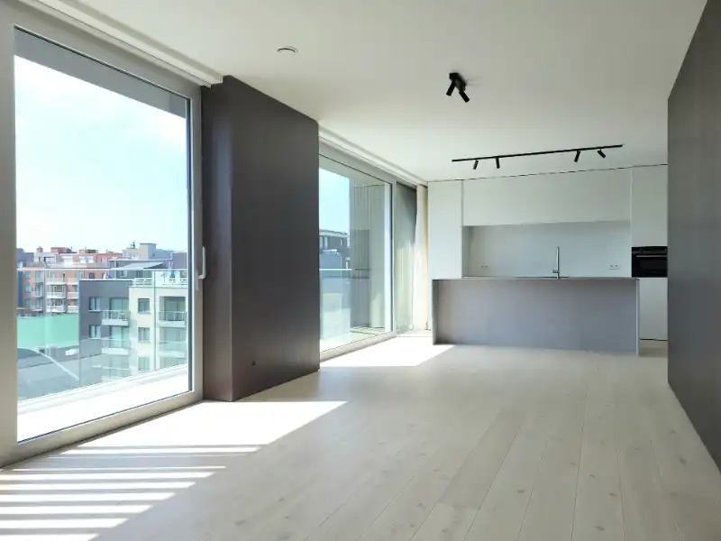 Modern nieuwbouwappartement met 3 slaapkamers in het centrum van Koksijde-Bad foto {{pictureIndex}}
