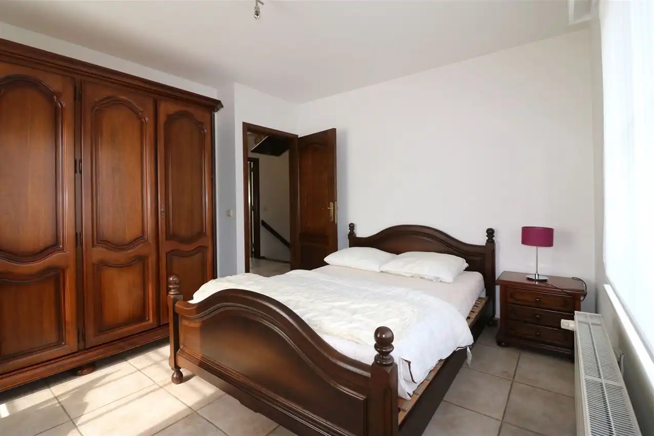 Gusting gelegen woning met 3 slp, garage en tuin foto 18