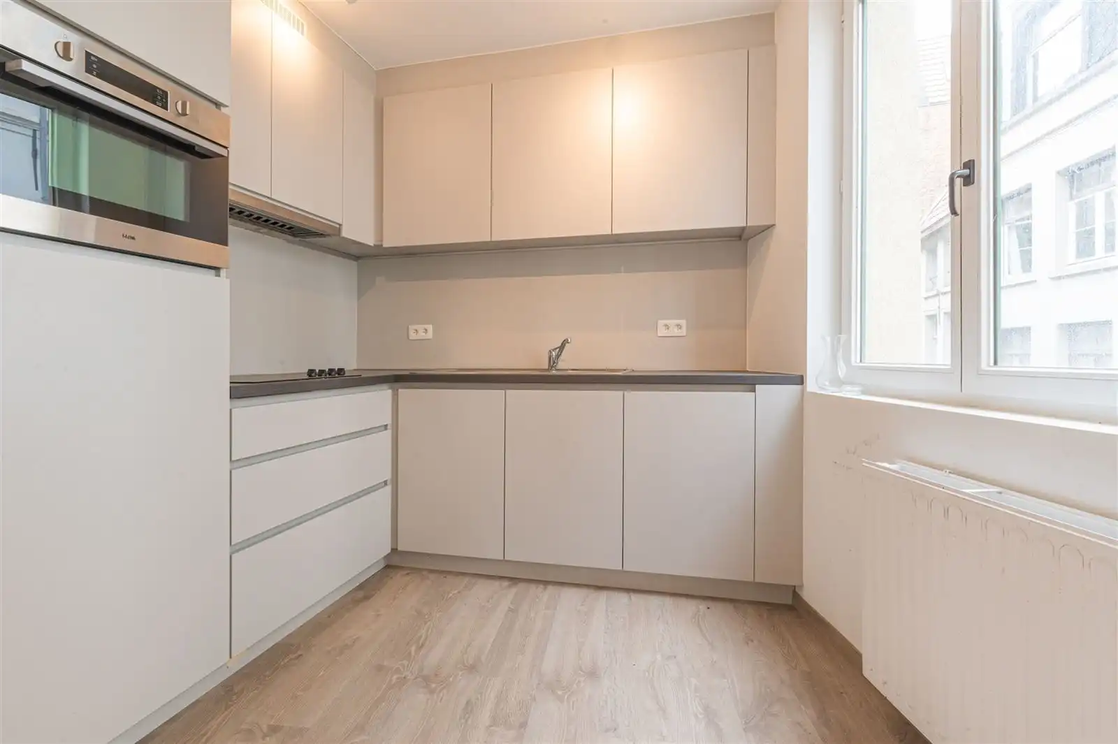 Opbrengstenwoning en handelsruimte foto 7