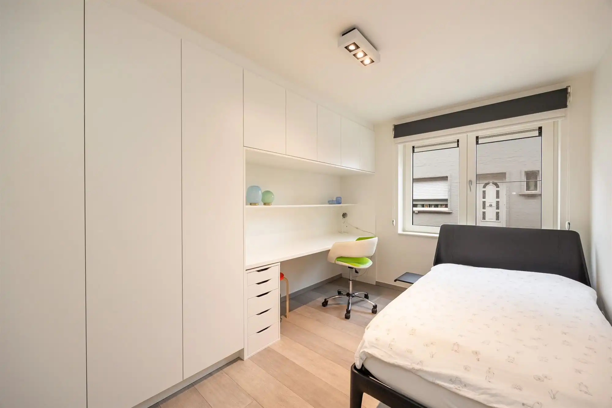 Instapklaar gelijkvloers appartement met tuin en carport foto 13