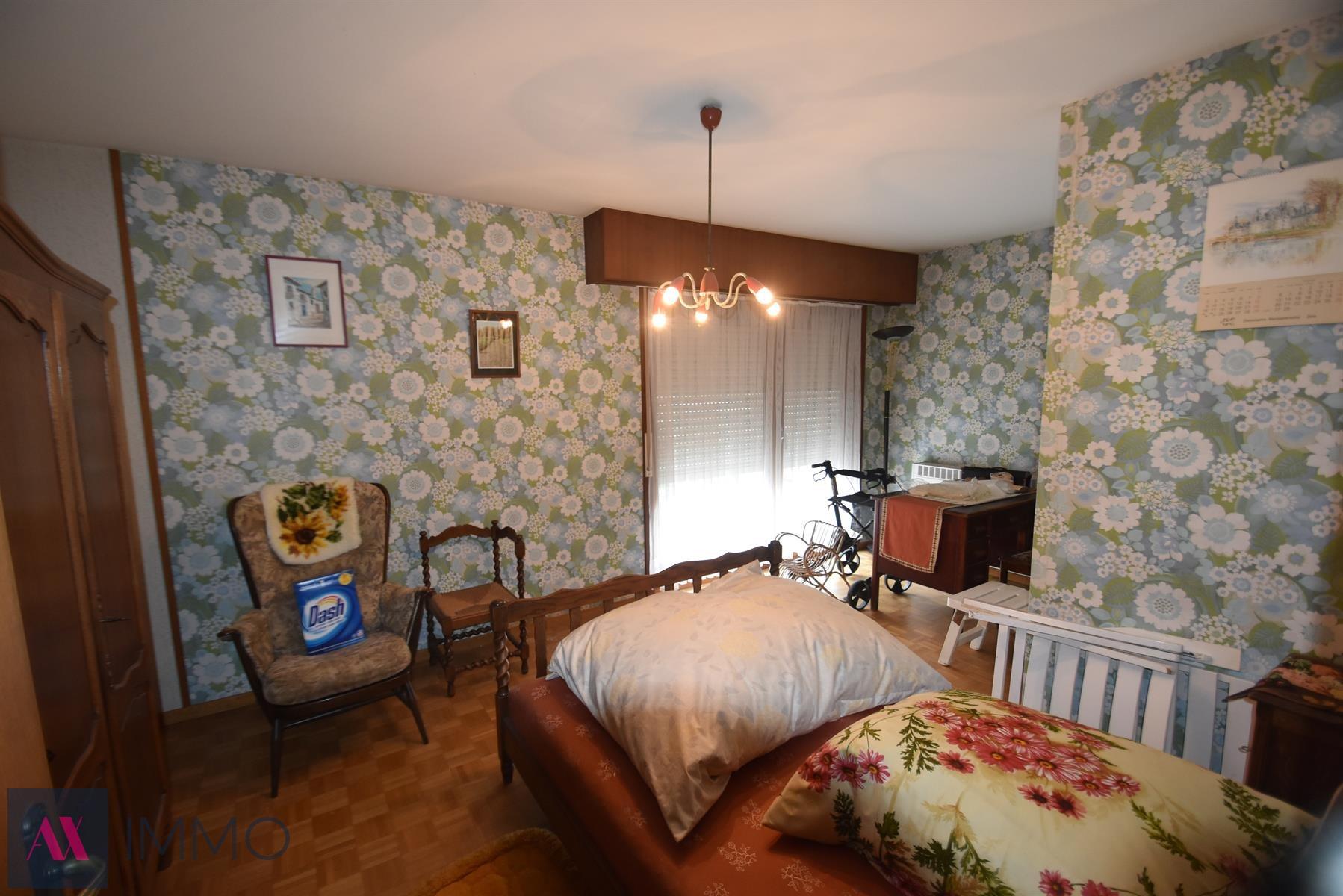 Centr. en rustig gel.woning met 3 slpk., gar., tuin en oprit op 4 are 80 ca foto 17